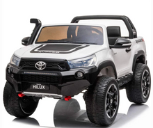 Load image into Gallery viewer, Ride on kids Hilux 4x4 4WD Licensed rechargeable Age 2-8 Years - E-Scooter UAE Hub
